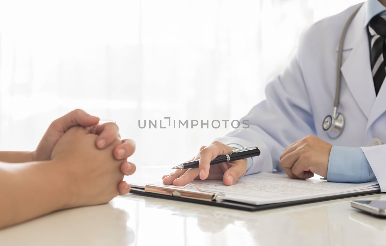 Doctors are recording information the patient's illness.