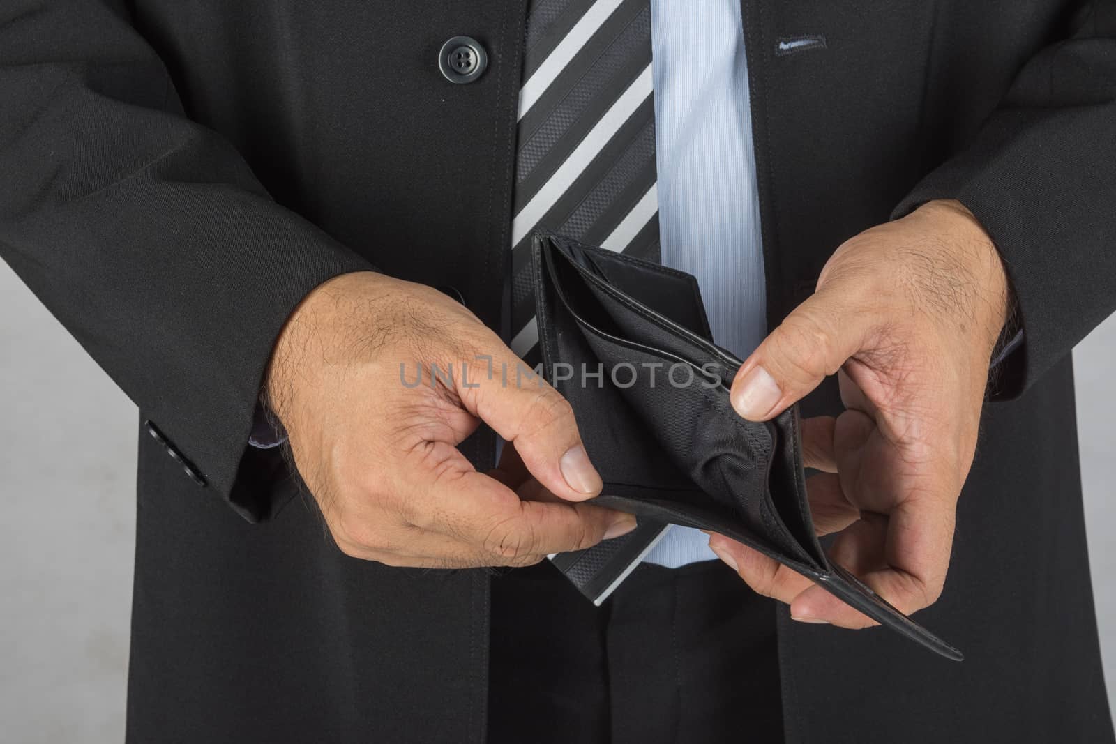 businessman showing an empty wallet no money.  bankrupt concept, finances concept,