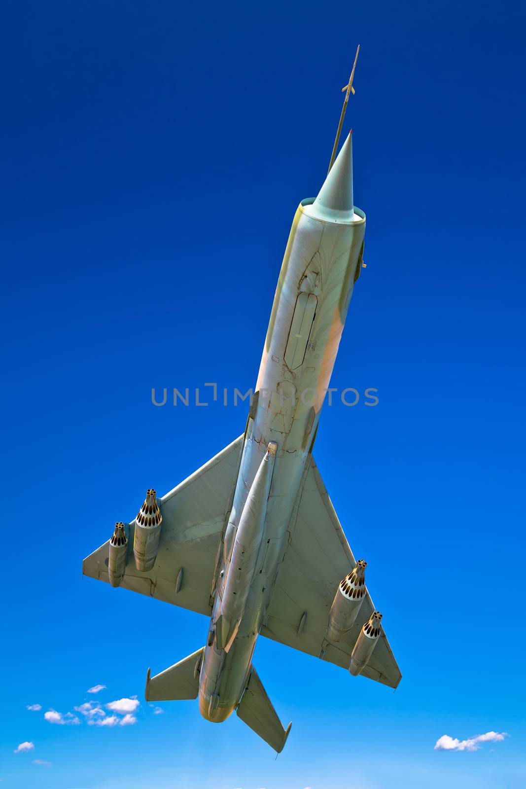 Fighter jet airplane flight under view, clear blue sky background