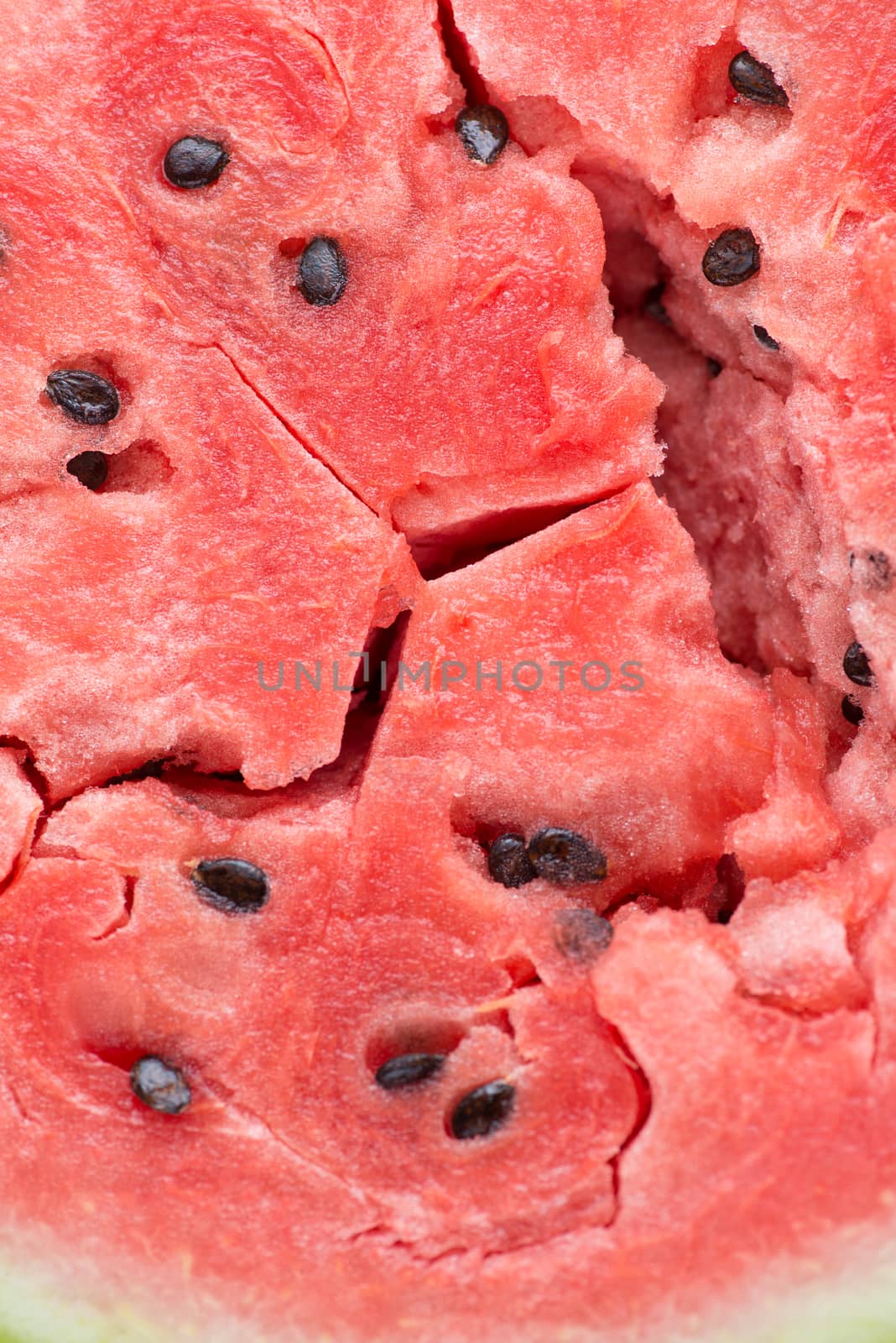 ripe watermelon flesh closeup macro texture background.