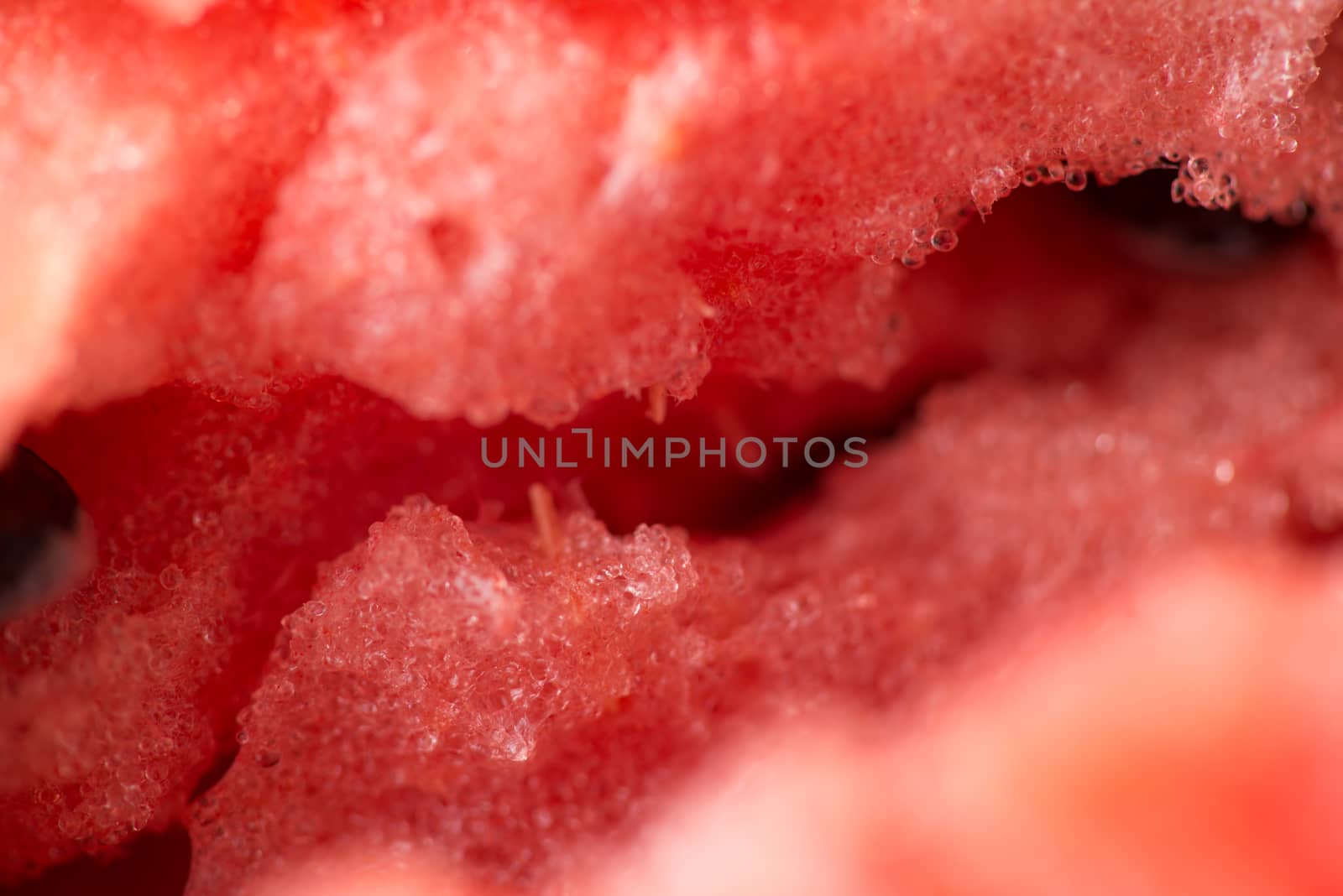 ripe watermelon flesh closeup macro texture background by skrotov