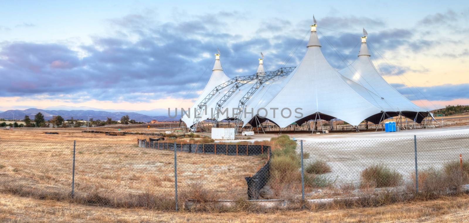 Sunset over a circus tent by steffstarr