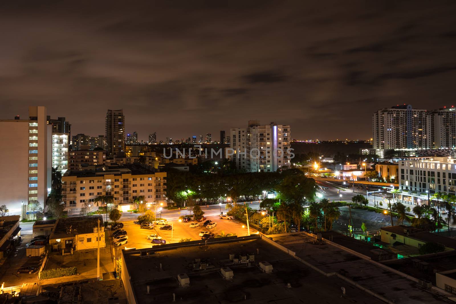 Long exposition night shot of Miami Beach, Florida, with Downtown Miami in the background.