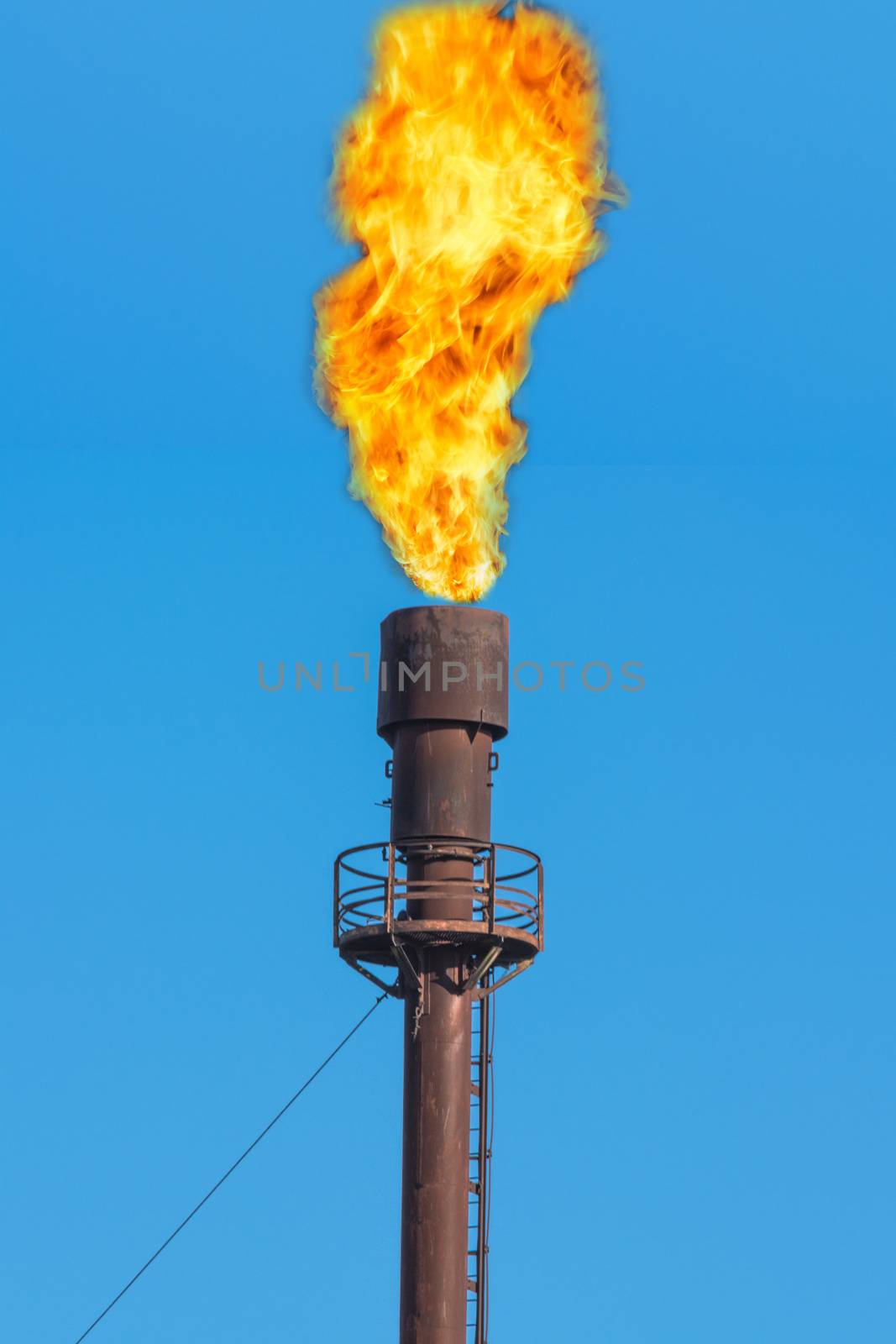 Chimney for controlled burning off of excess gas.