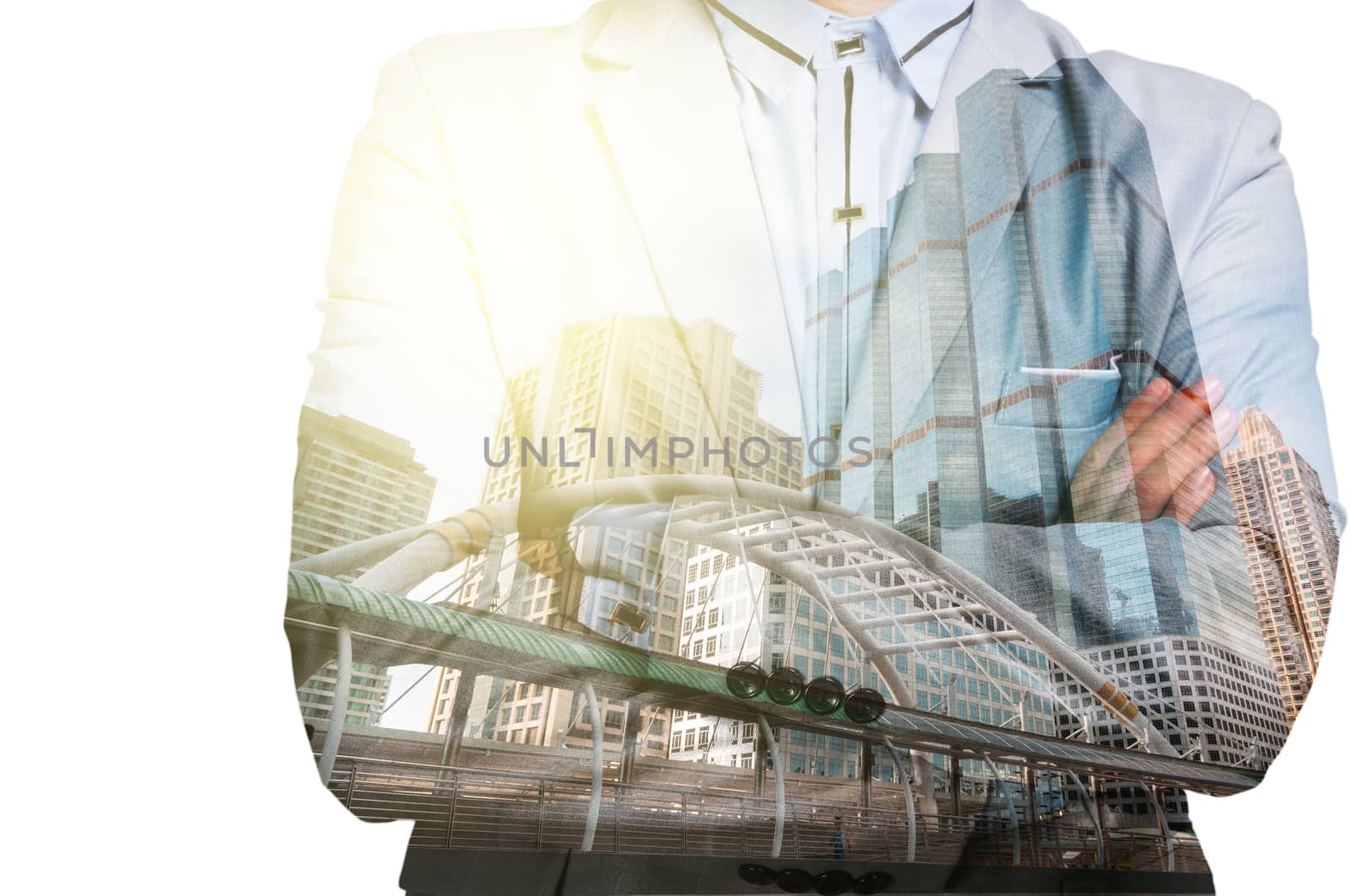 Double Exposure of Businessman and Business building City at Sunrise as Business Concept