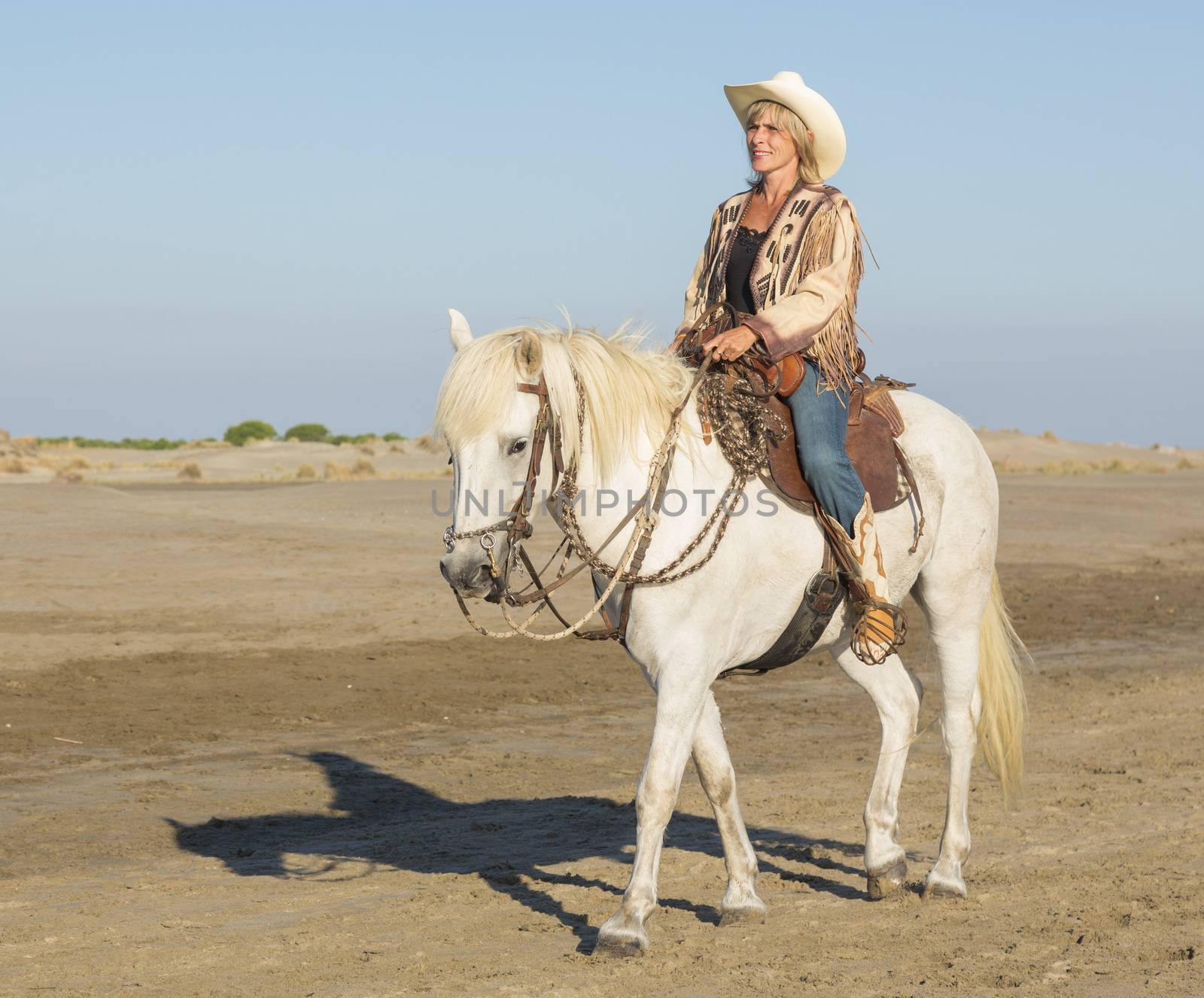 cowgirl on camargue horse by cynoclub