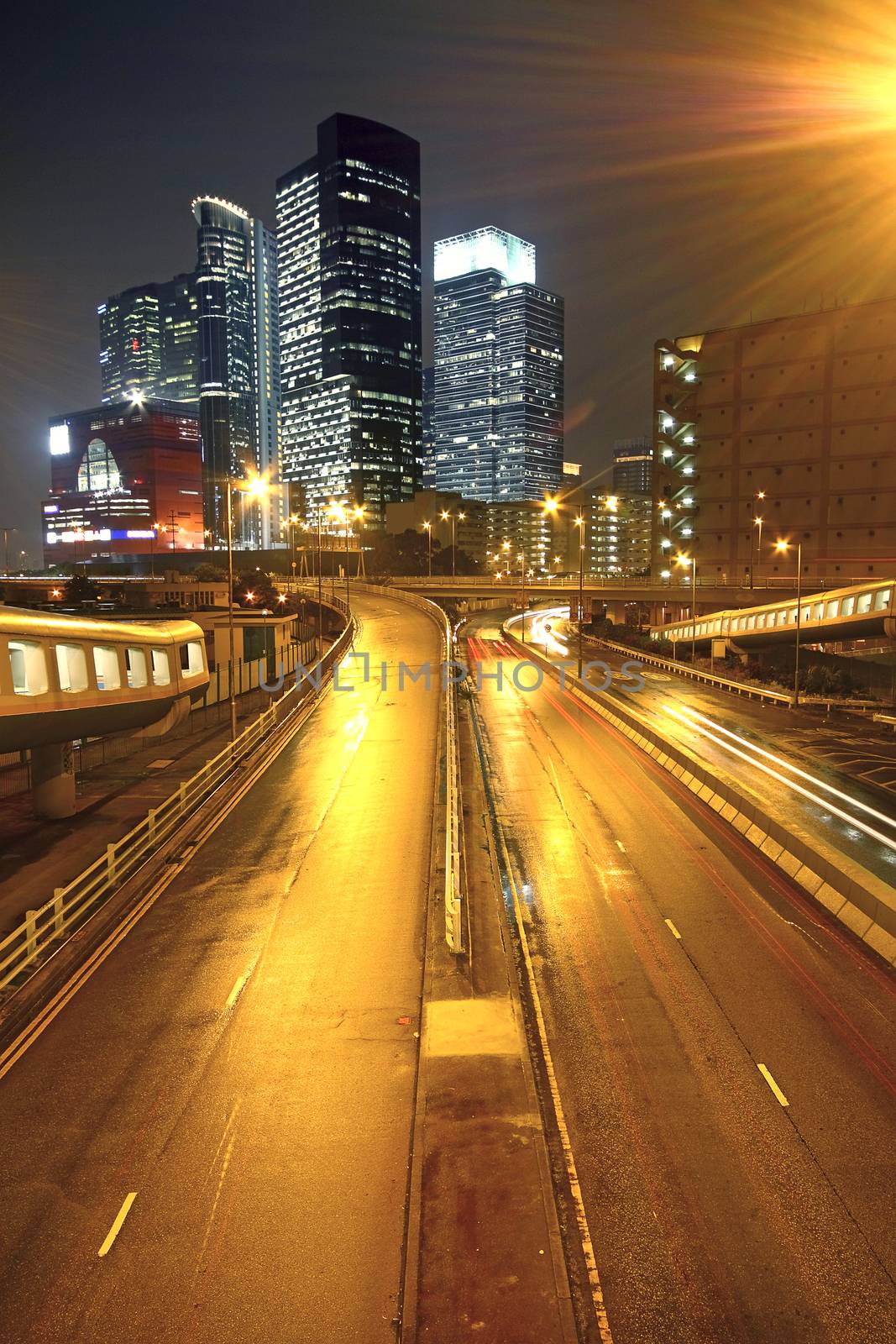 urban landscape at night and through the city traffic 