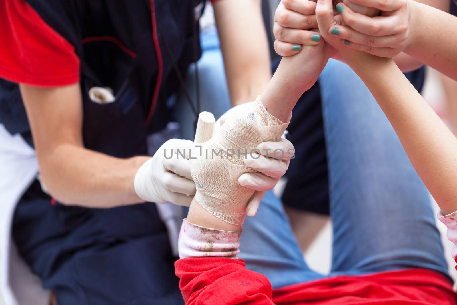 Hand bandaging. First aid training. by wellphoto