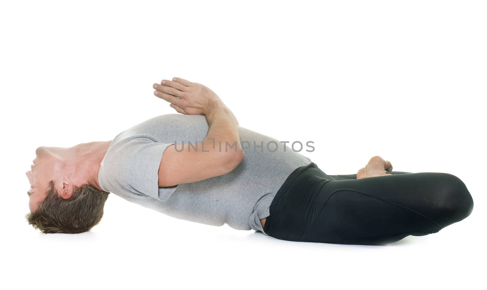 yoga man in studio by cynoclub