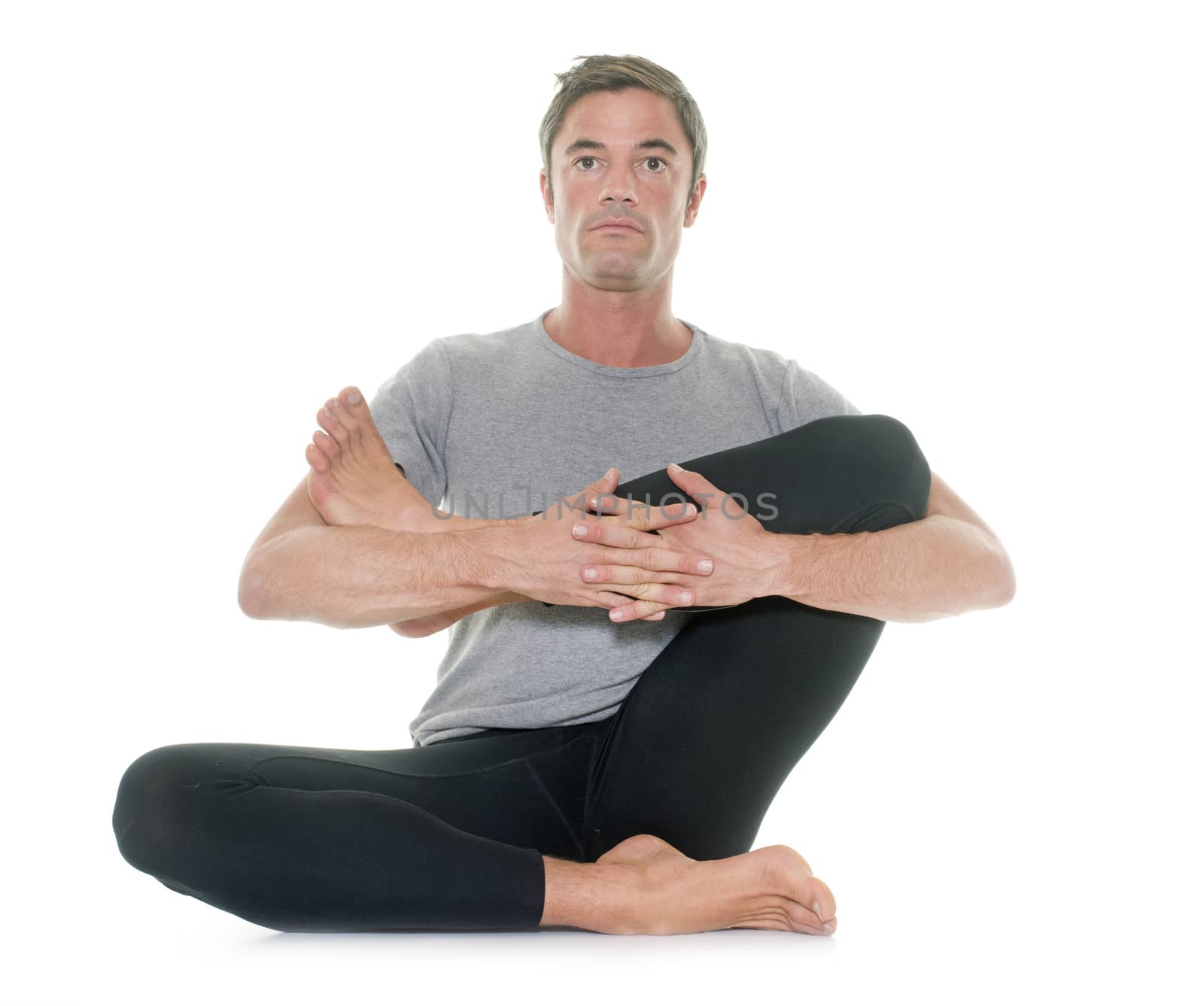 yoga man in front of white background