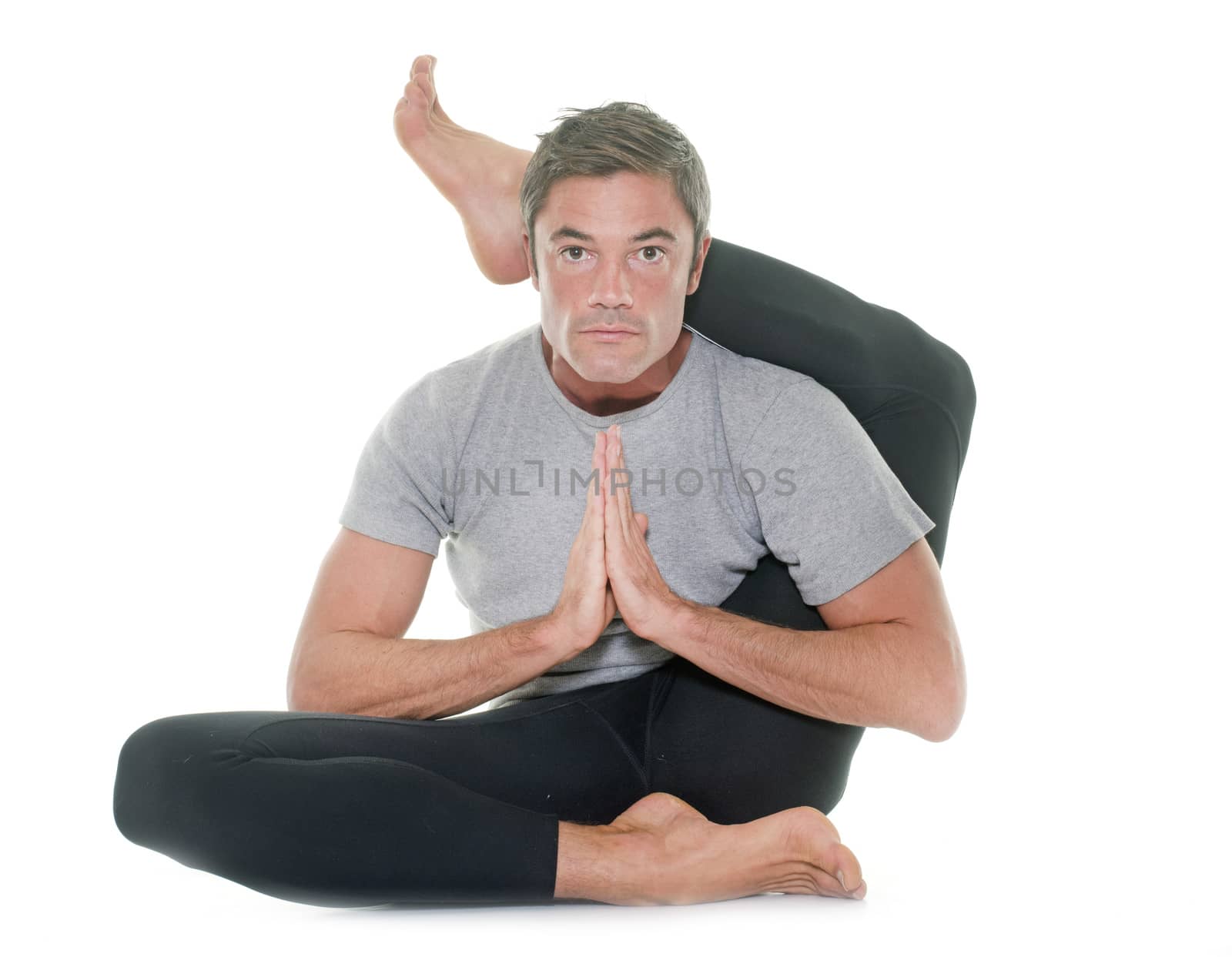 yoga man in front of white background