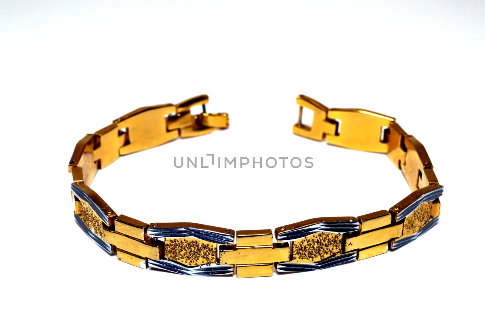 Bracelet gilded with small diamonds and rectangles blue.