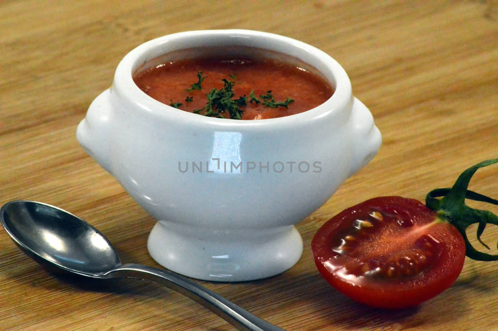 Cream of tomato soup in a white bowl by Philou1000