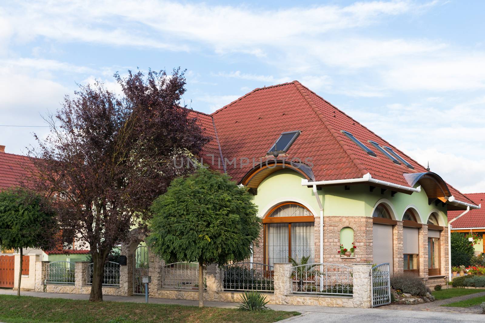 Detached house. Well-kept. Beautiful house. Detached house with ornamental trees and flowers around. by AndrewBu