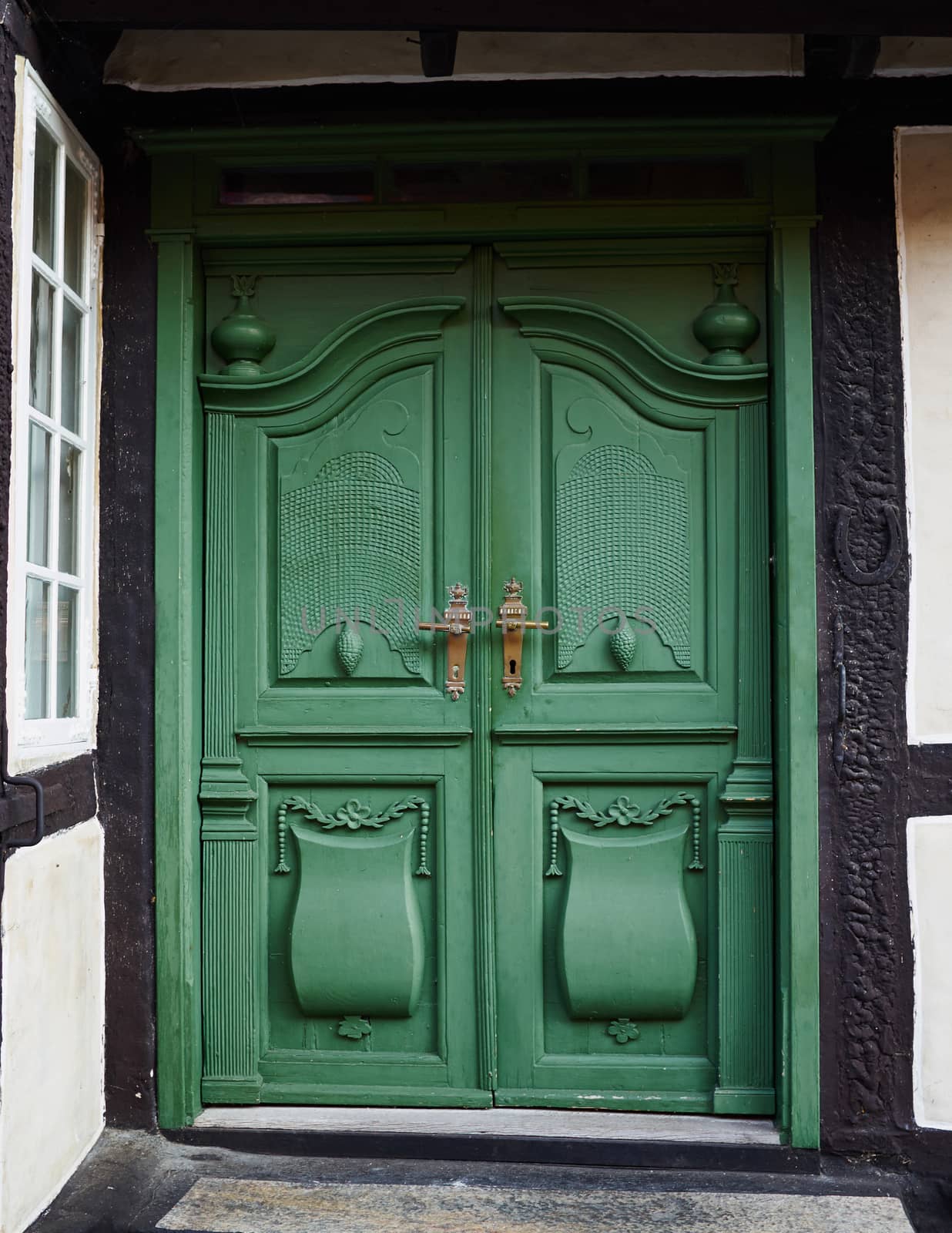 Traditional colorful craft vintage wooden green front door Denmark