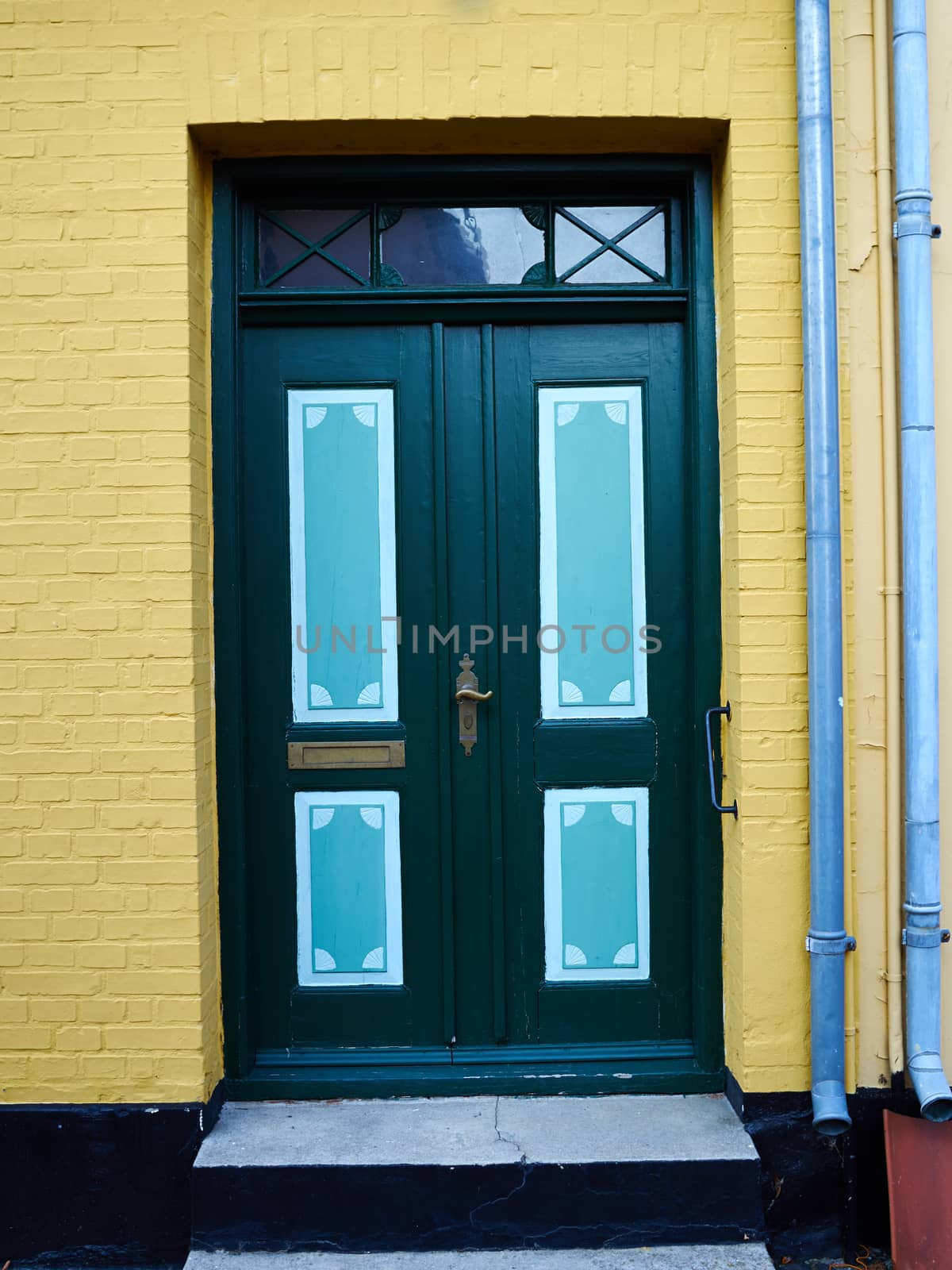 Traditional colorful front door Denmark by Ronyzmbow