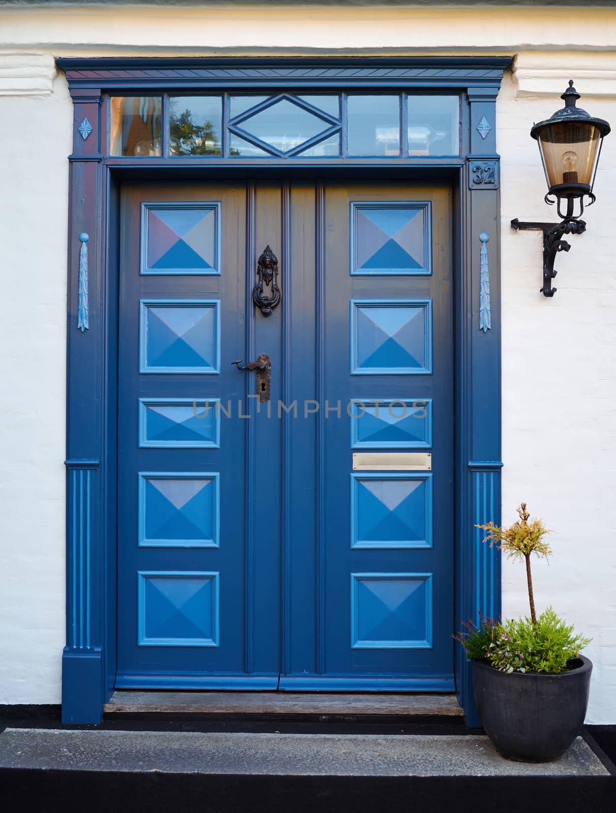 Traditional colorful front door Denmark by Ronyzmbow