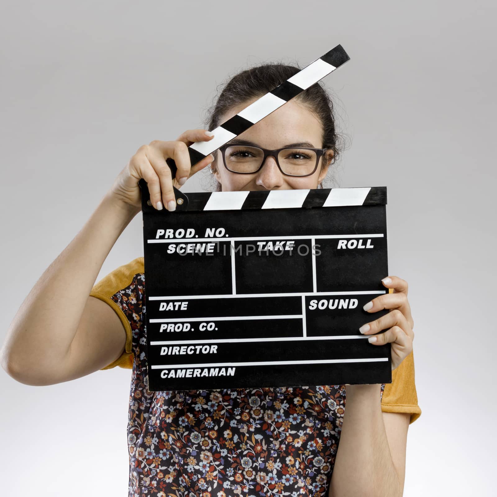 Woman with a clapboard by Iko