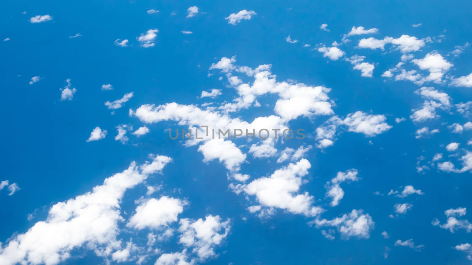 The beautiful cloudy and blue sky (view from airplane).