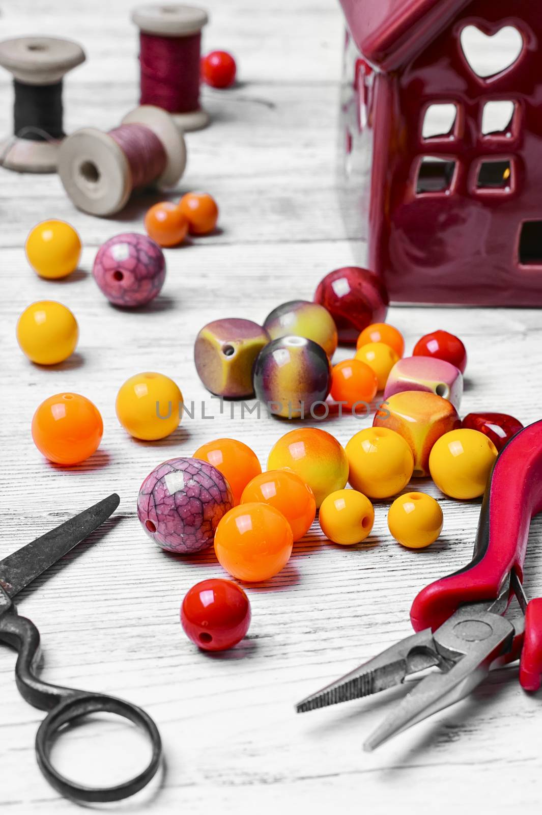 Yellow beads for jewelry making and tools