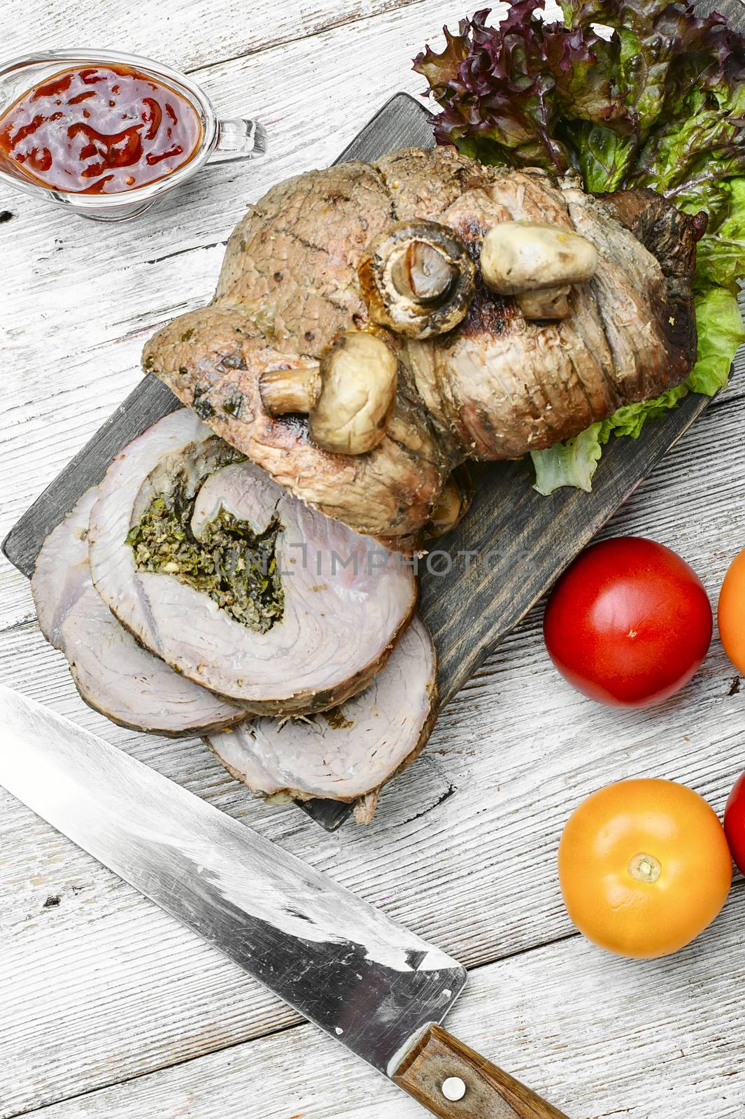 Meatloaf of veal on the kitchen cutting board