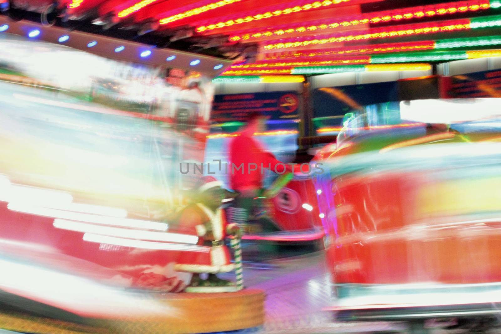 Night colors of the amusement park lights moving, light trails, slow shutter-speed