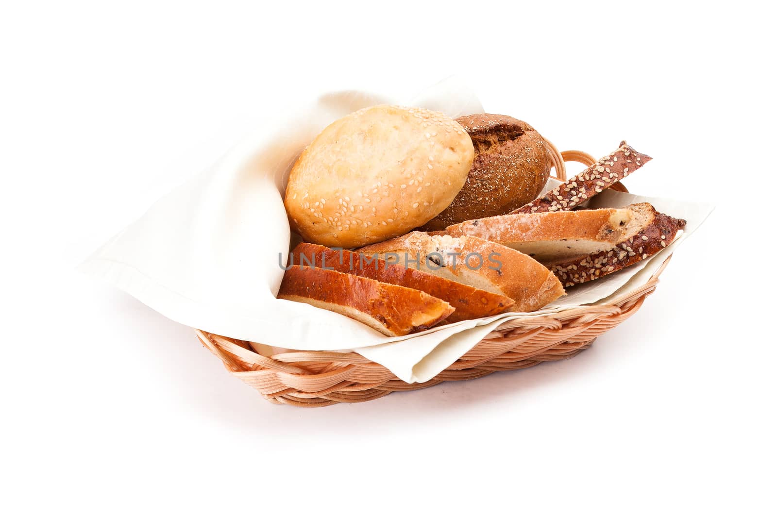 Newly-baked bun with sesame, piece of of white and black bread in a basket. Isolated on white background.