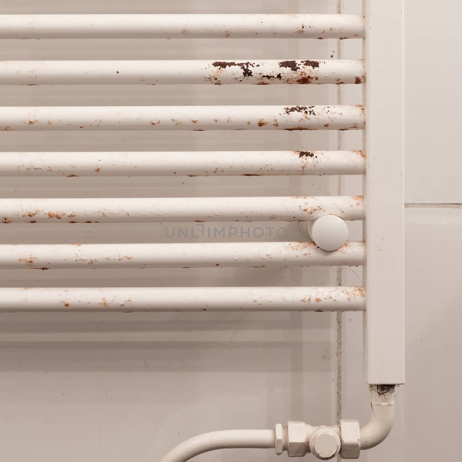 Rusty household cast iron radiator by michaklootwijk