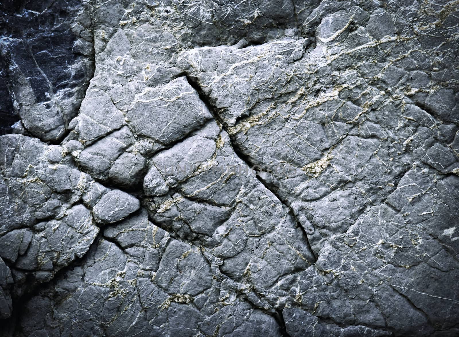 abstract background or texture dark stone with grooves