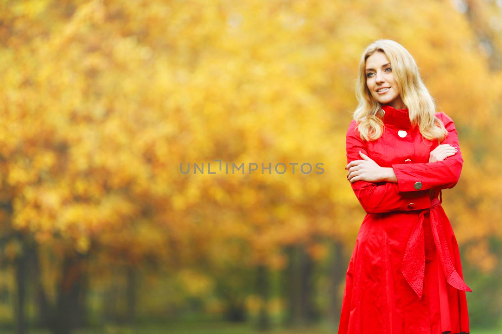 Young woman in autumn park by Yellowj