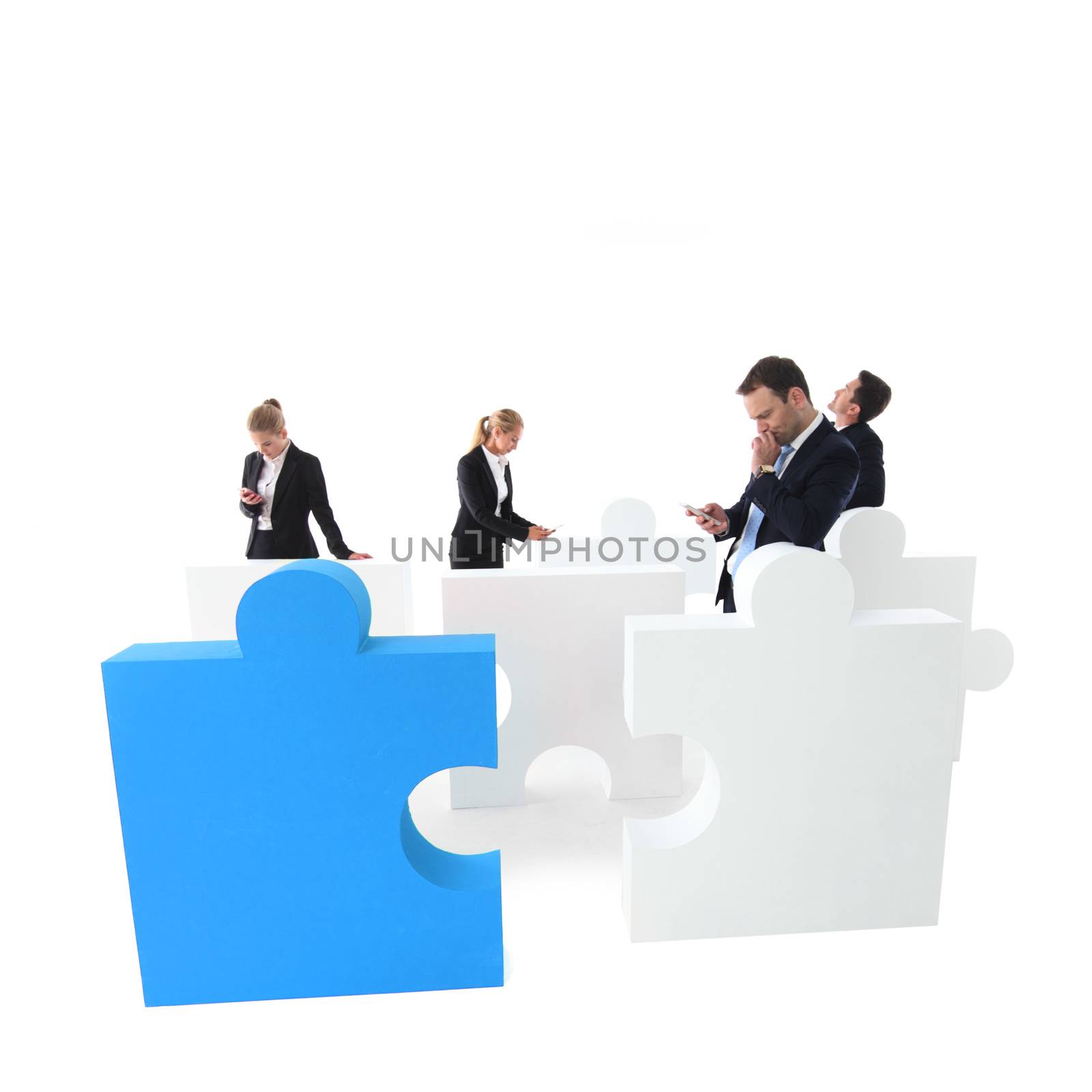 Group of business people with cell phones and puzzle pieces isolated on white backgrund