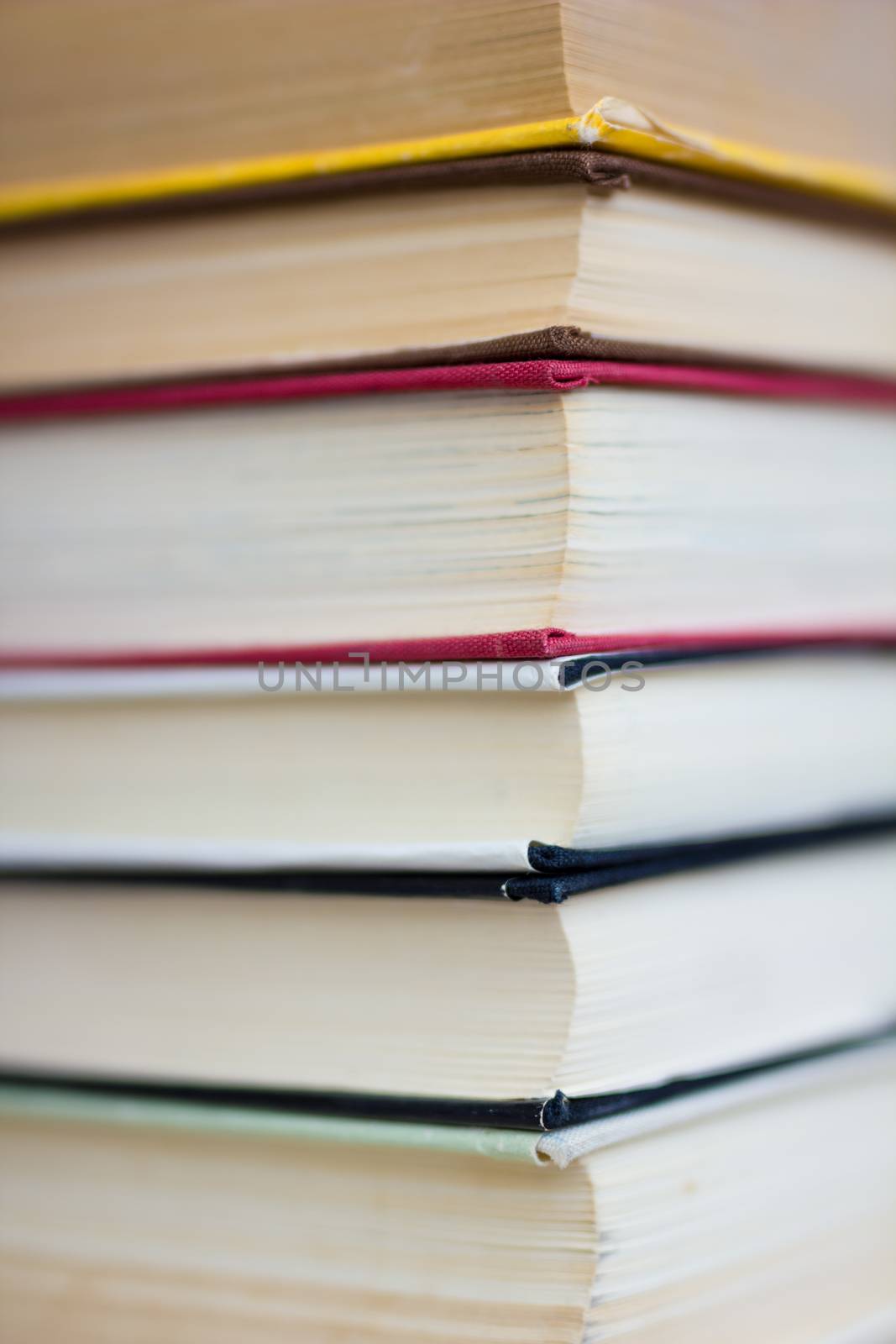 Closeup of stacked old books and textbook