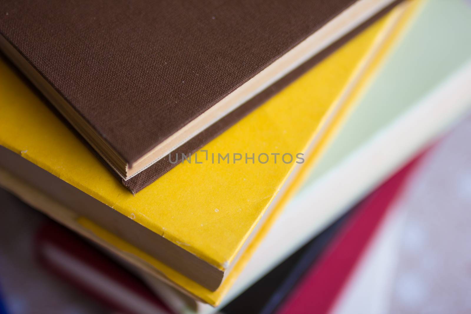 Closeup of stacked old books and textbook