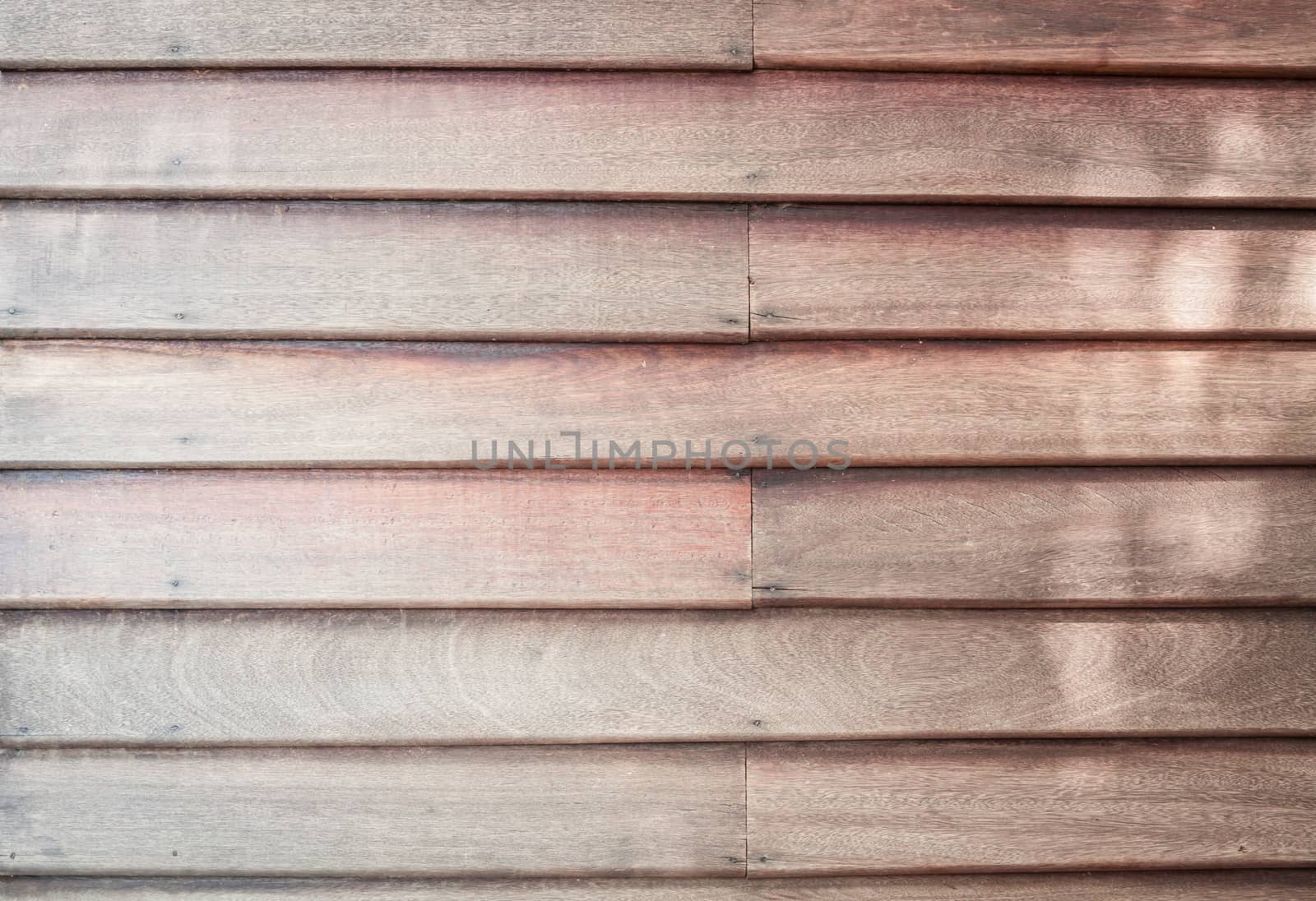 Brown wooden wall texture background by punsayaporn