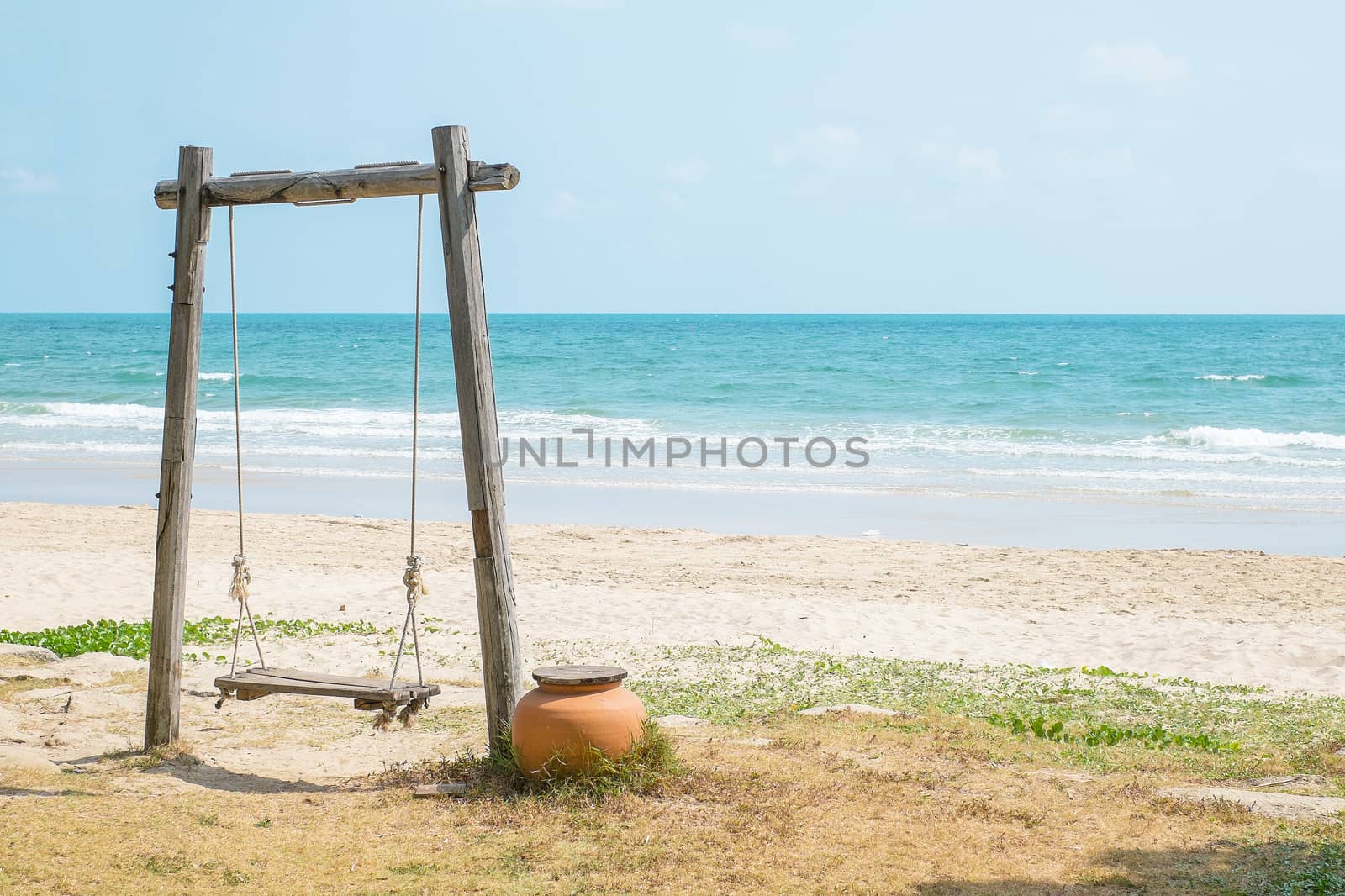 wood swing on the beach by baworn47