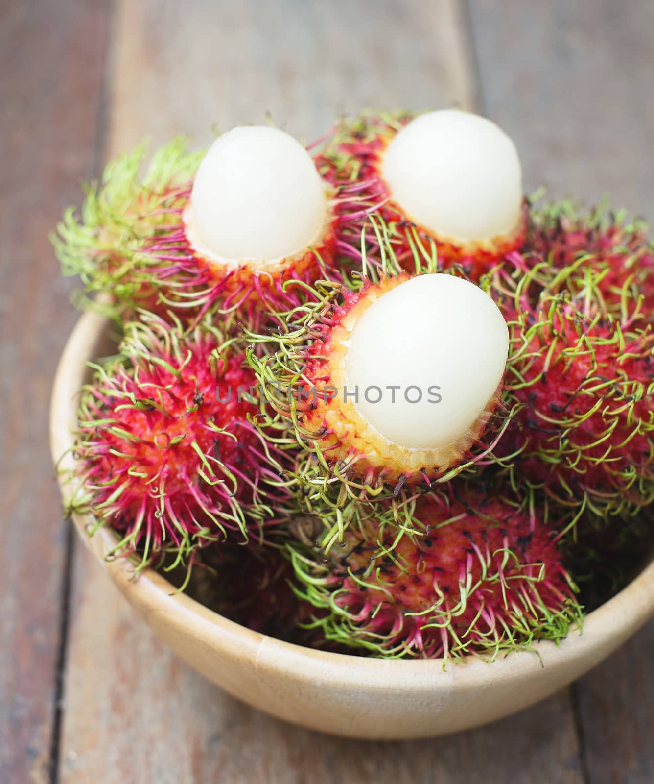 rambutan on wood by baworn47