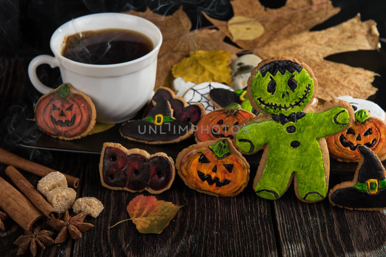 Homemade delicious ginger biscuits for Halloween on wooden table