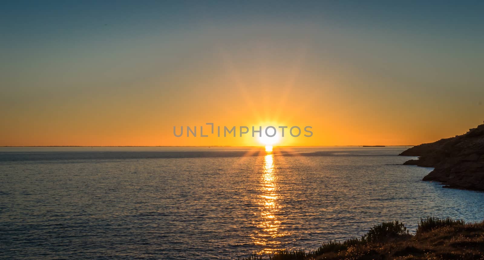 Sunset against the backdrop of the Atlantic Ocean by okskukuruza