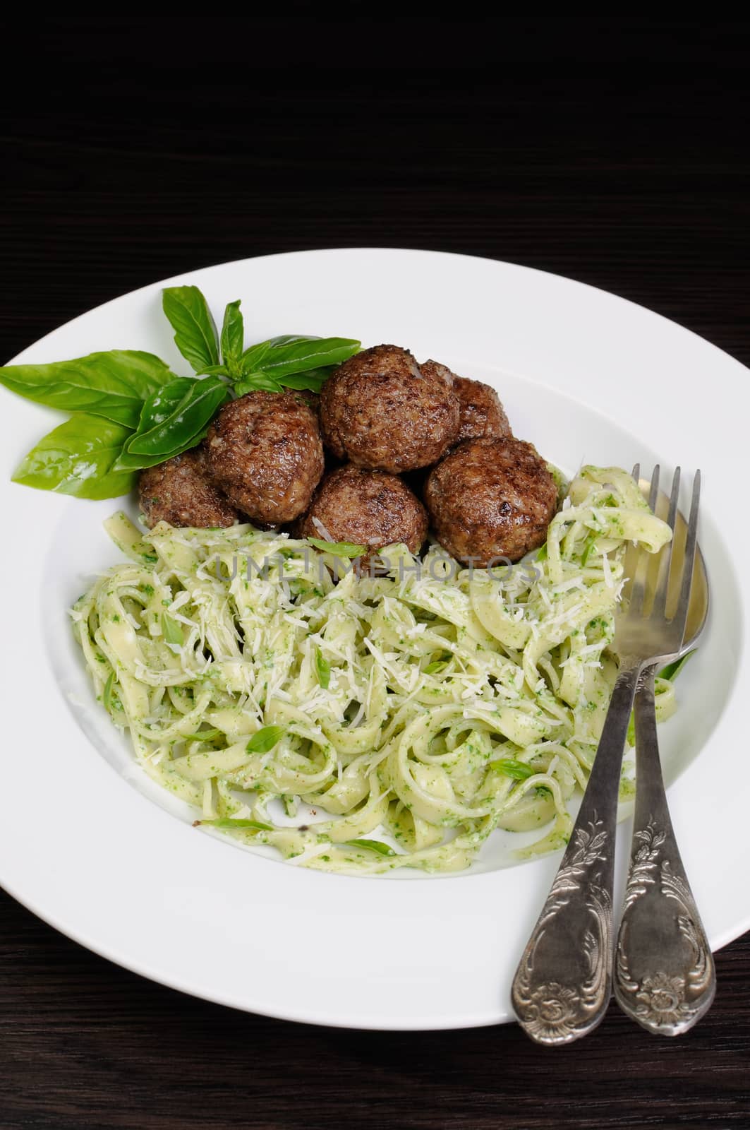 Meatballs with pasta sauce avocado,  parmesan and basil