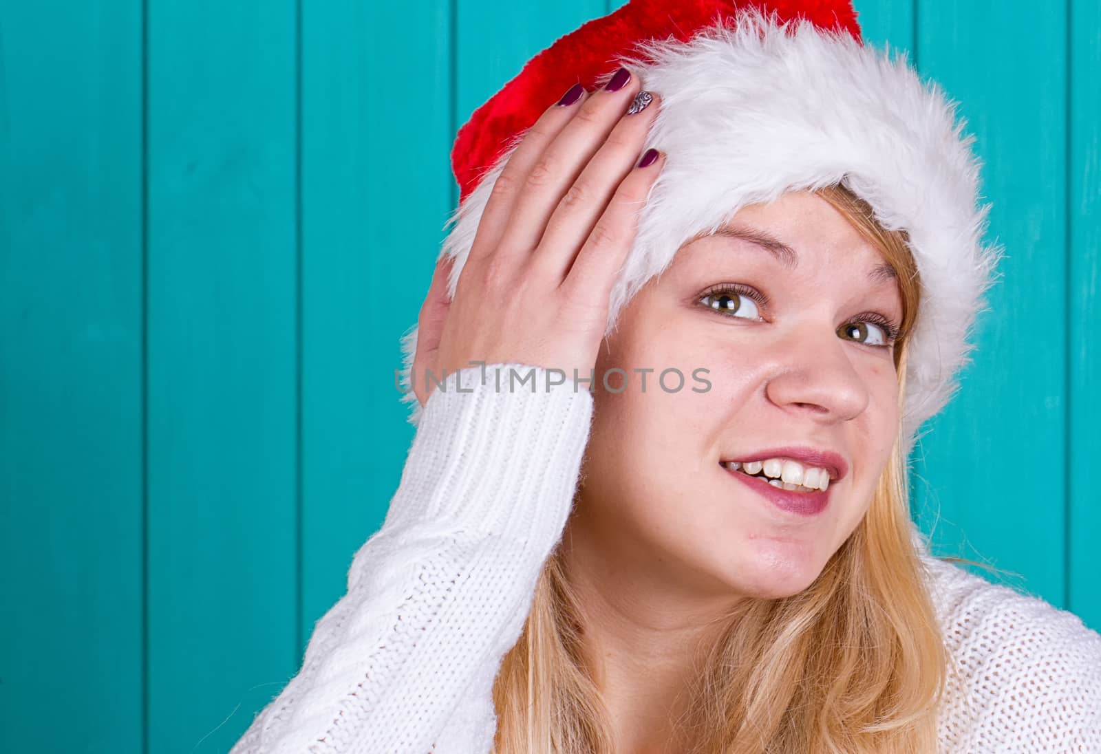 Beautiful woman in Christmas cap by victosha