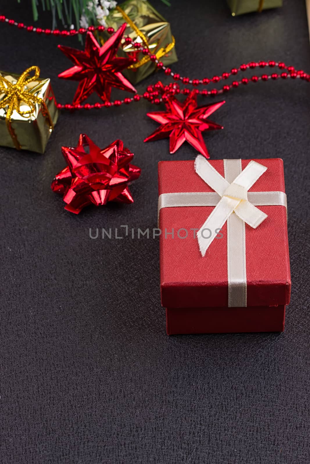 Christmas or New Year dark wooden background, Xmas black board framed with season decorations, space for a text, view from above