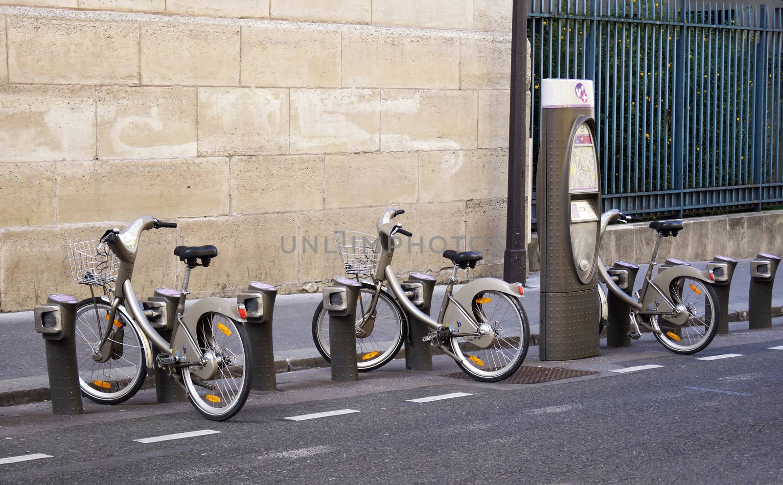 PARIS, FRANCE - SEPTEMBER 27, 2015: Bicycles parked at Velib station in Paris, France 