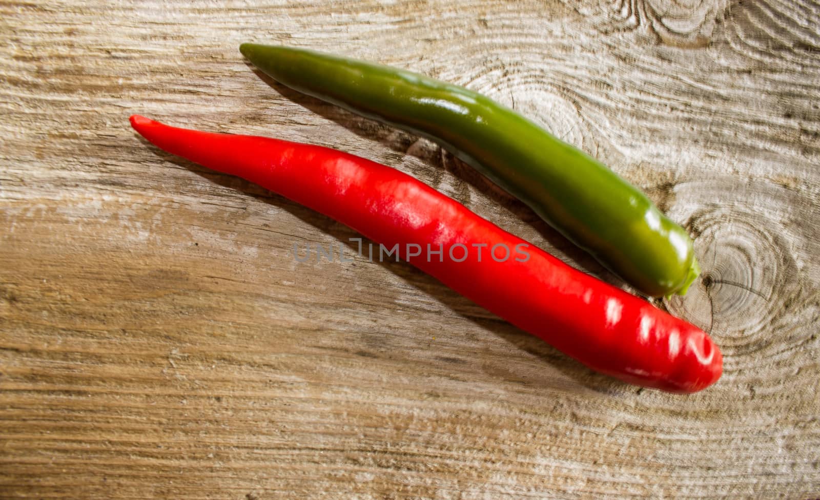 Chili pepper on weathered wood'n plate