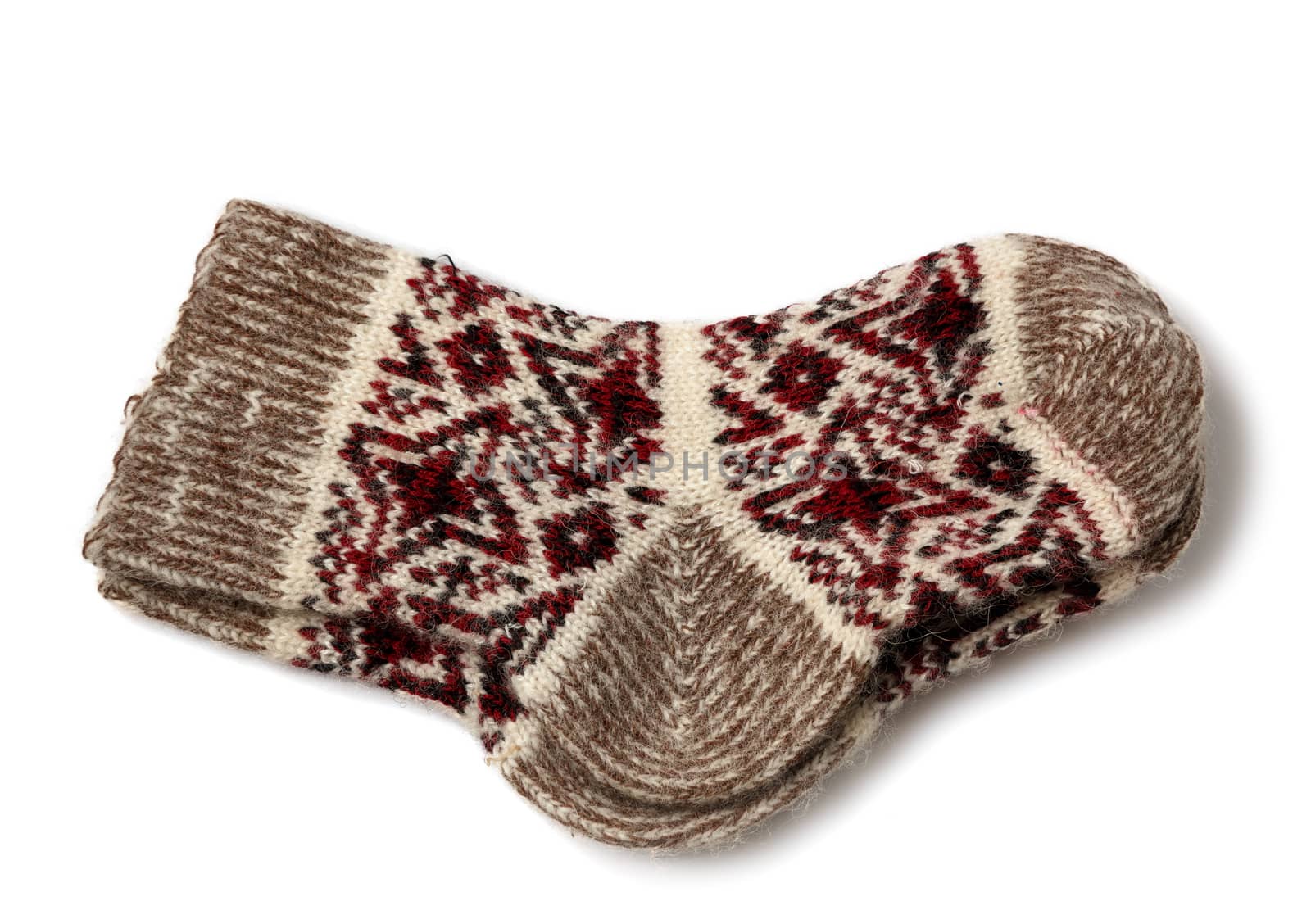 knitted woolen socks on a white background