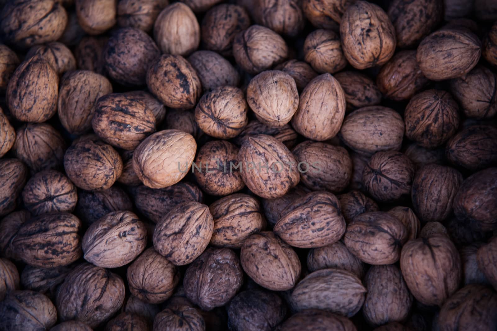 Walnuts. Background of walnuts.  by LarisaP