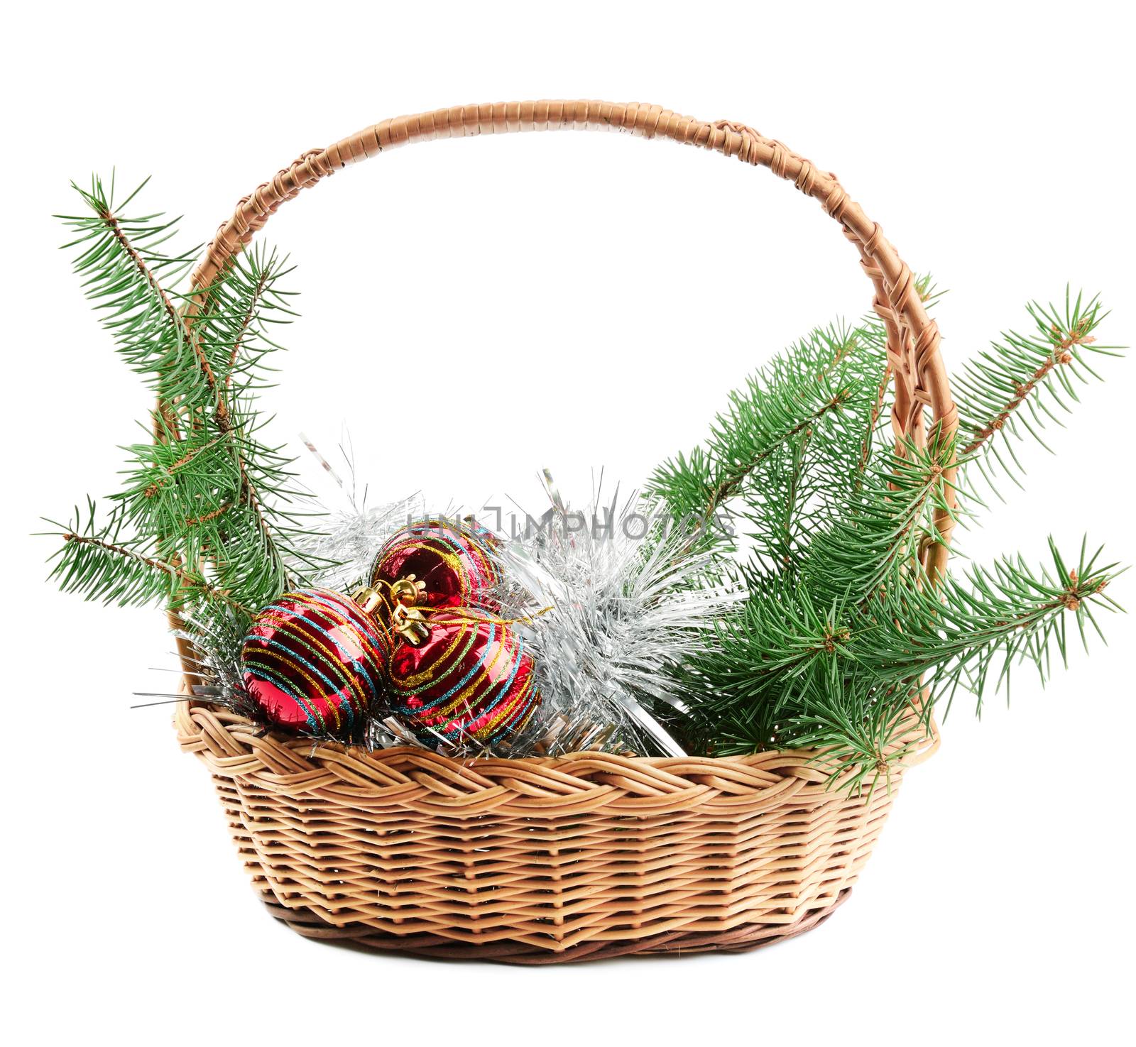 Christmas decorations and spruce twigs isolated on white background