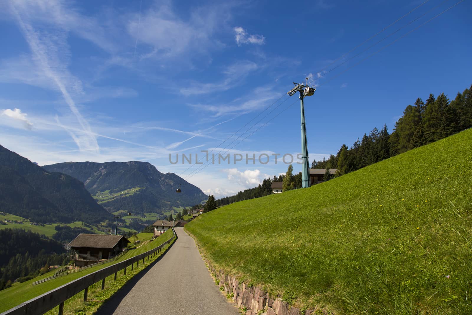 Bottom view of a cableway in a sunny day in Seiser Alm