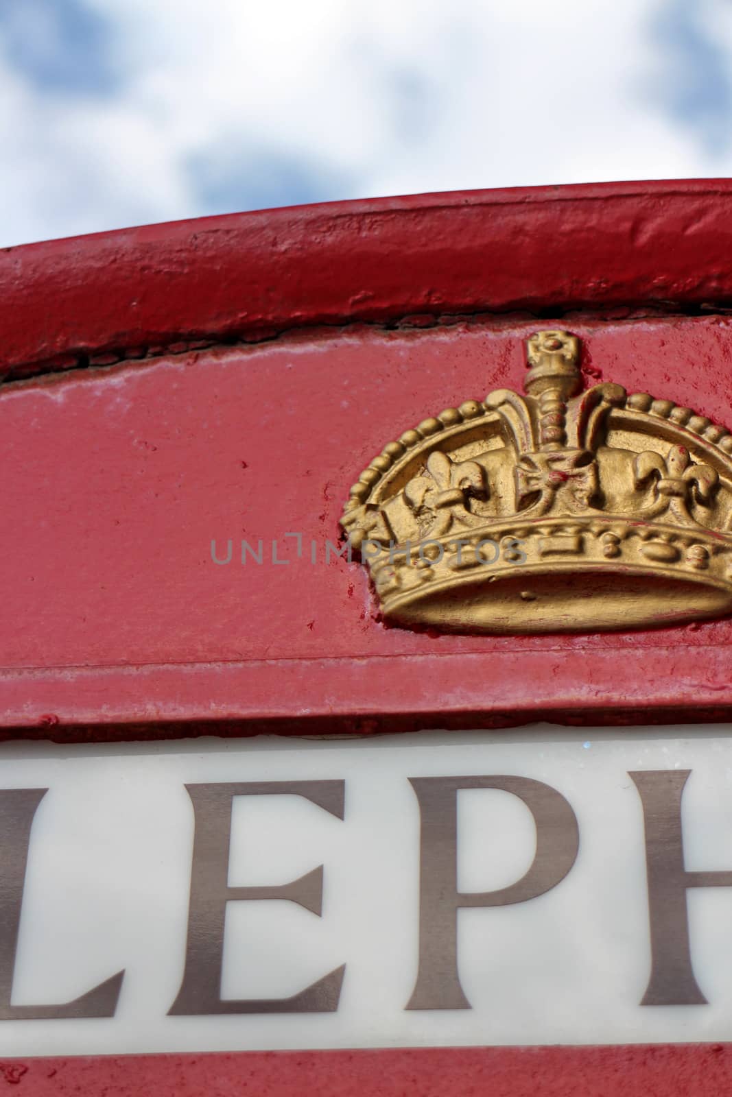 crown on a red telephone booth