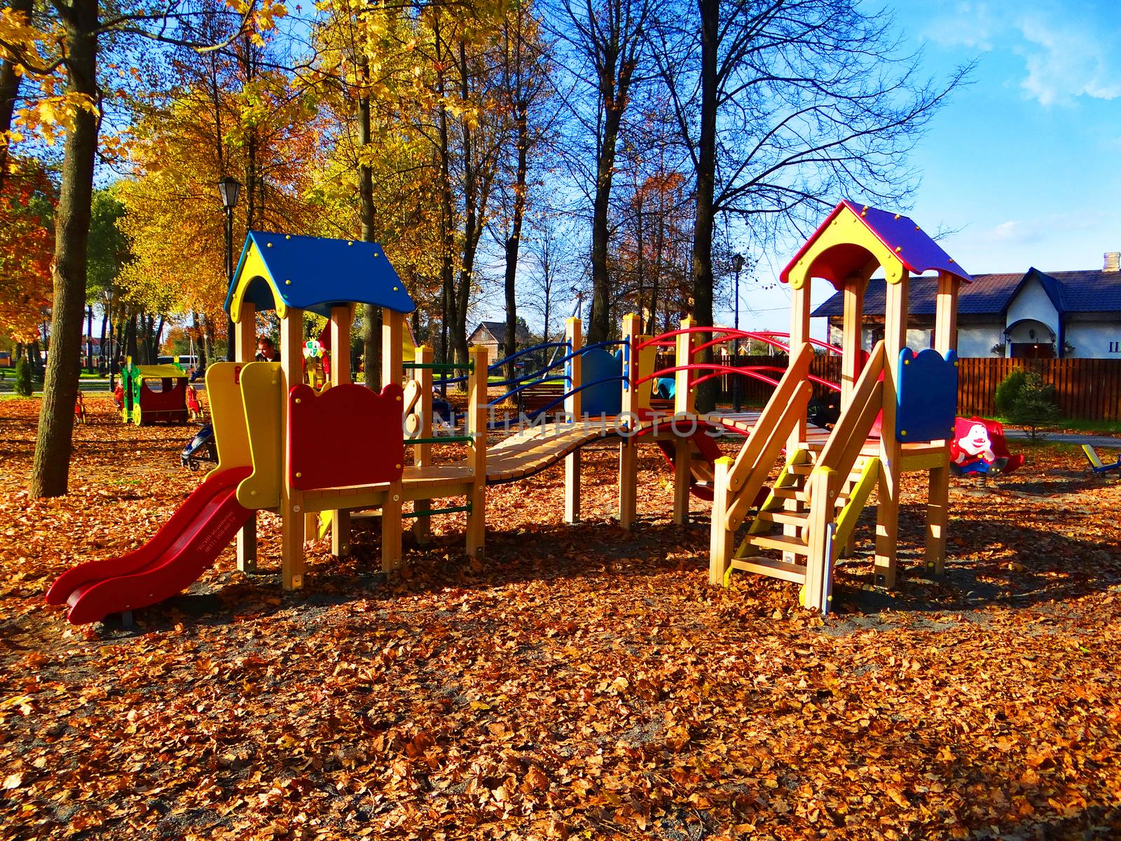 A picture of a playground in Autumn by natali_brill