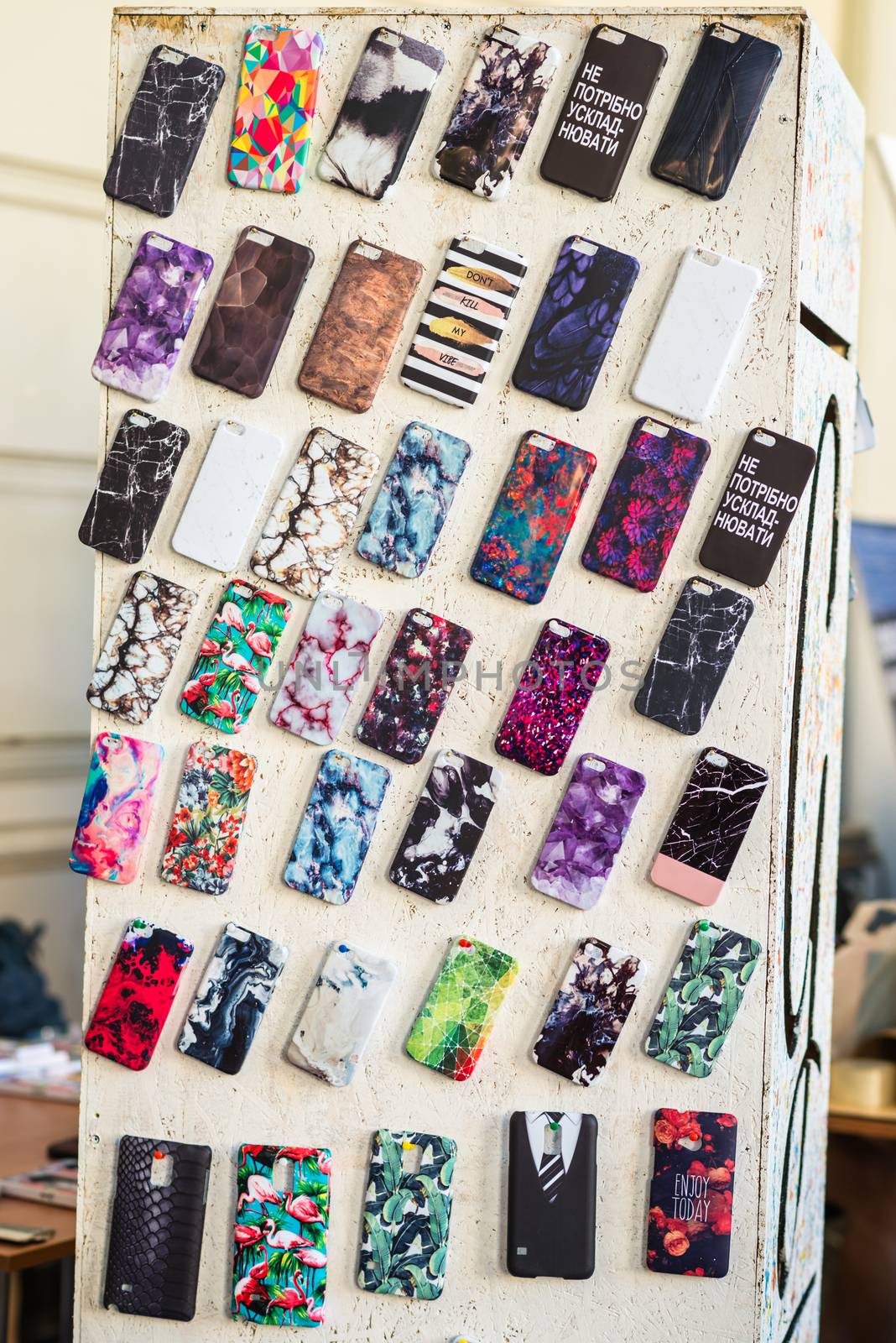 wooden board covered with covers for phones by okskukuruza